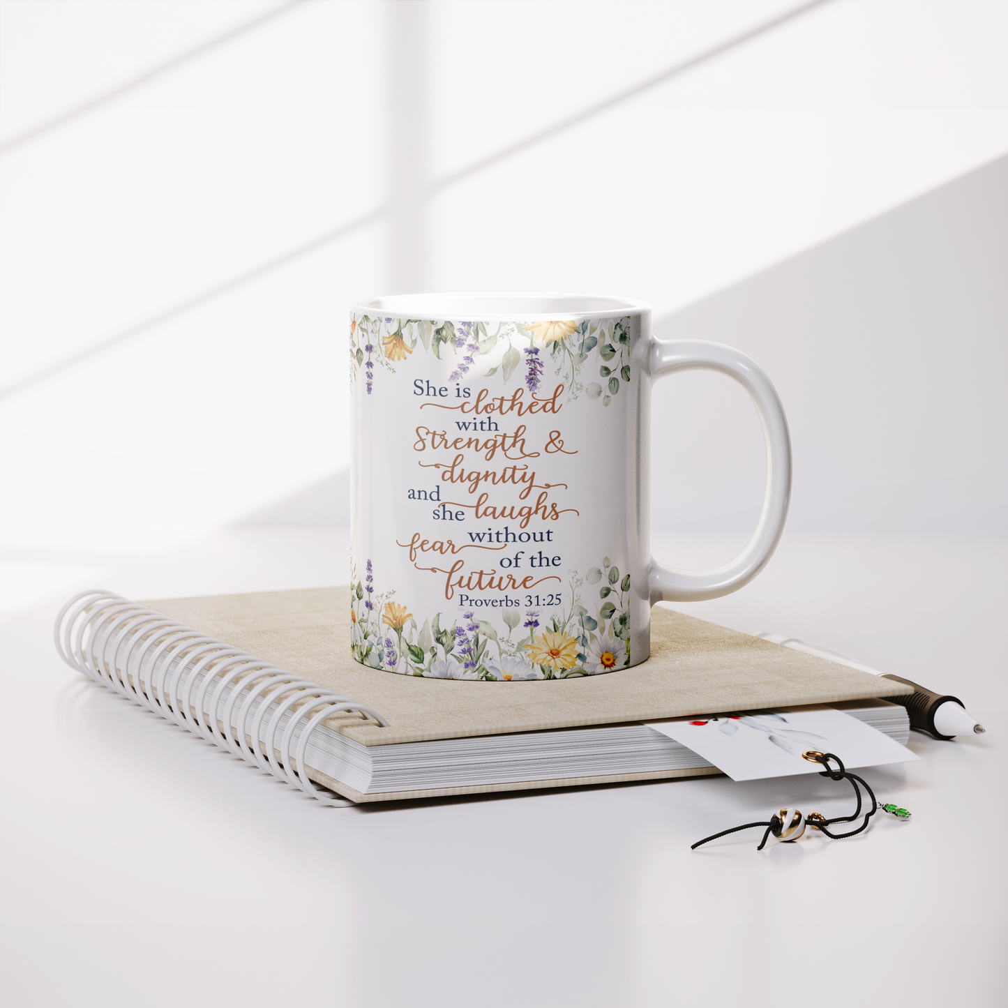 She_is_Clothed_in_Strength_and_Dignity_-_Lifestyle_Notebook_Mockup.png