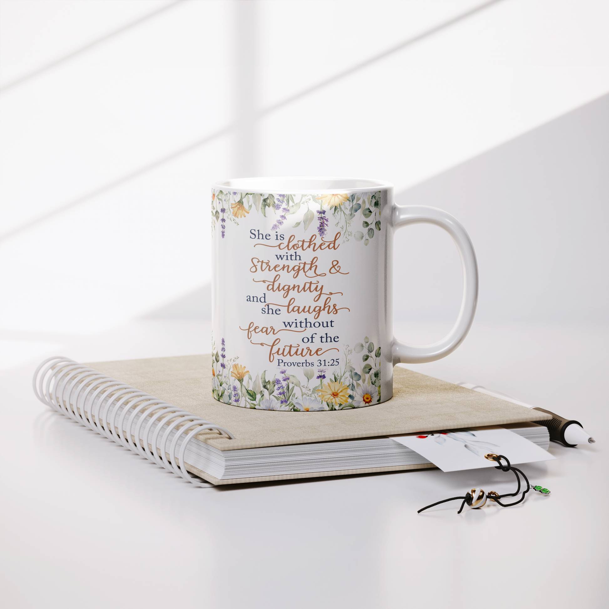 She_is_Clothed_in_Strength_and_Dignity_-_Lifestyle_Notebook_Mockup.png