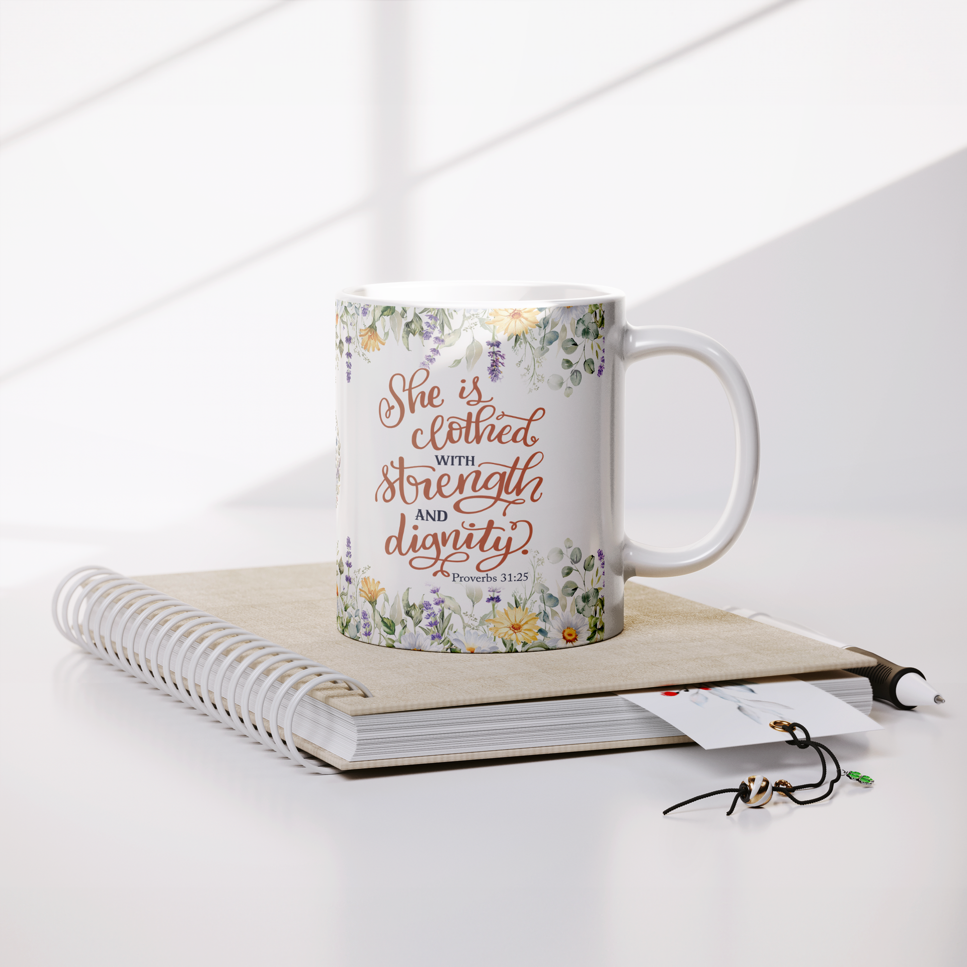 She_is_Clothed_in_Strength_and_Dignity_-_Lifestyle_Notebook_Mockup.png