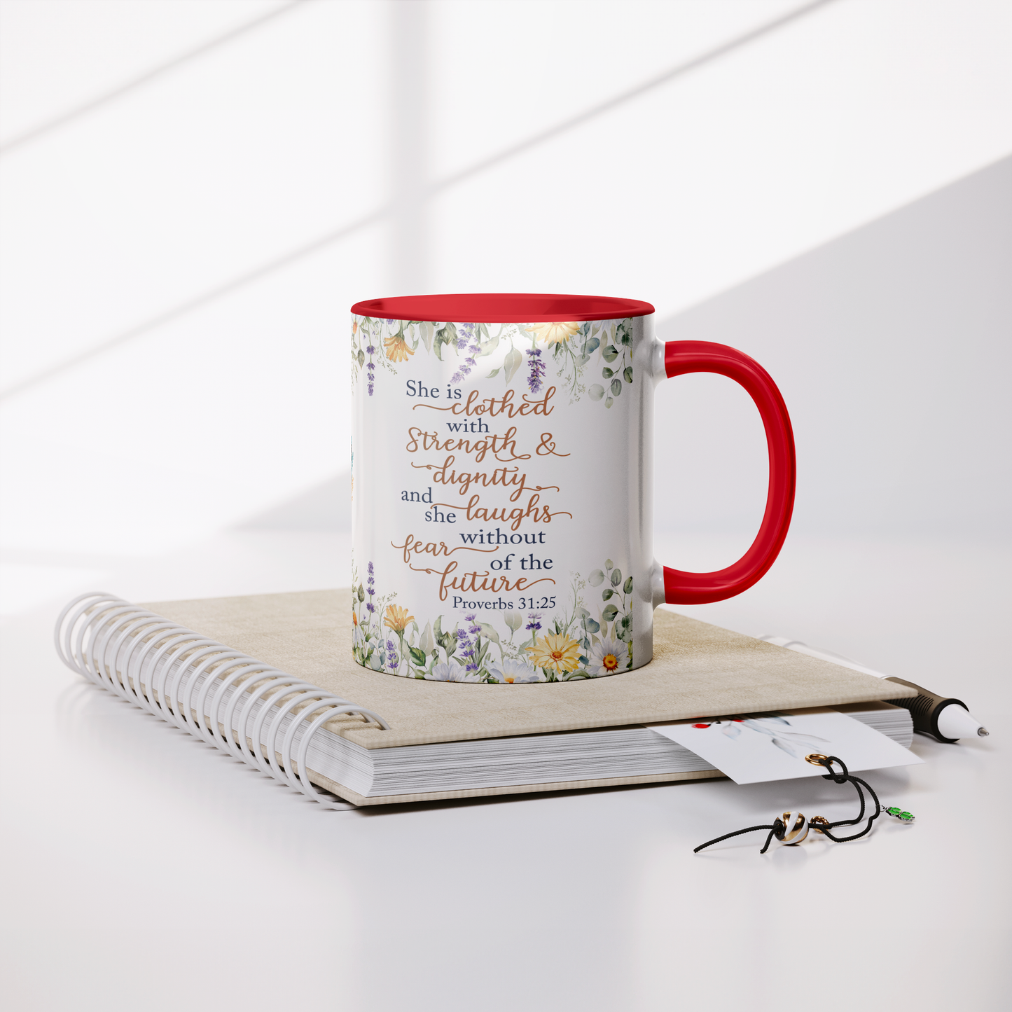 She_is_Clothed_in_Strength_and_Dignity_-_Lifestyle_Notebook_Mockup.png