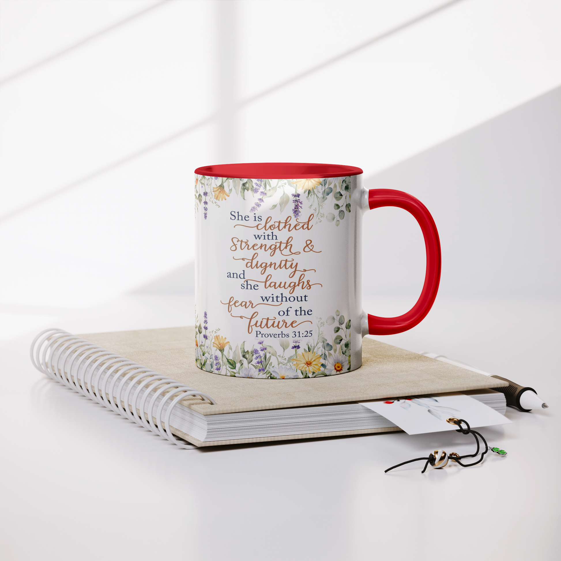 She_is_Clothed_in_Strength_and_Dignity_-_Lifestyle_Notebook_Mockup.png