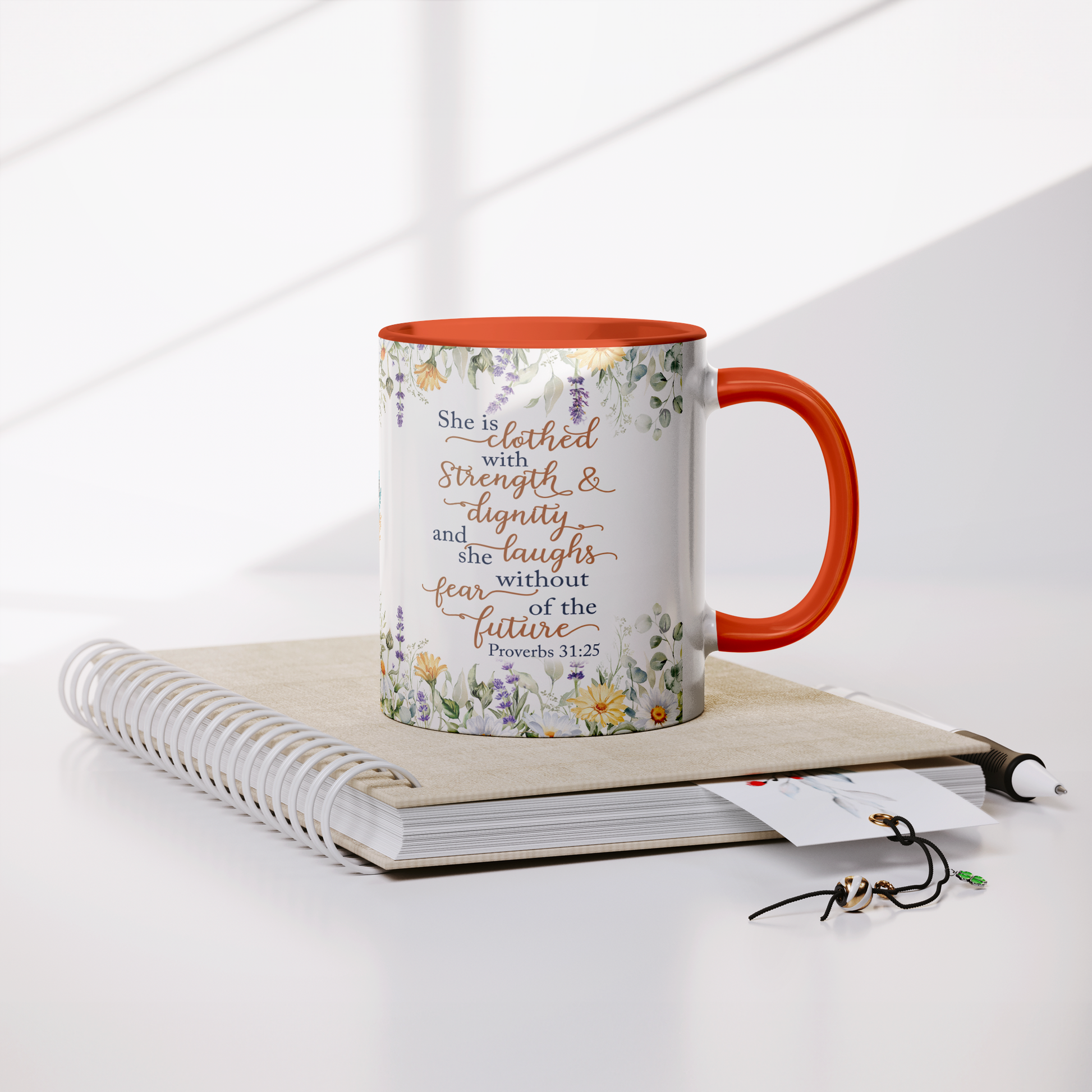 She_is_Clothed_in_Strength_and_Dignity_-_Lifestyle_Notebook_Mockup.png