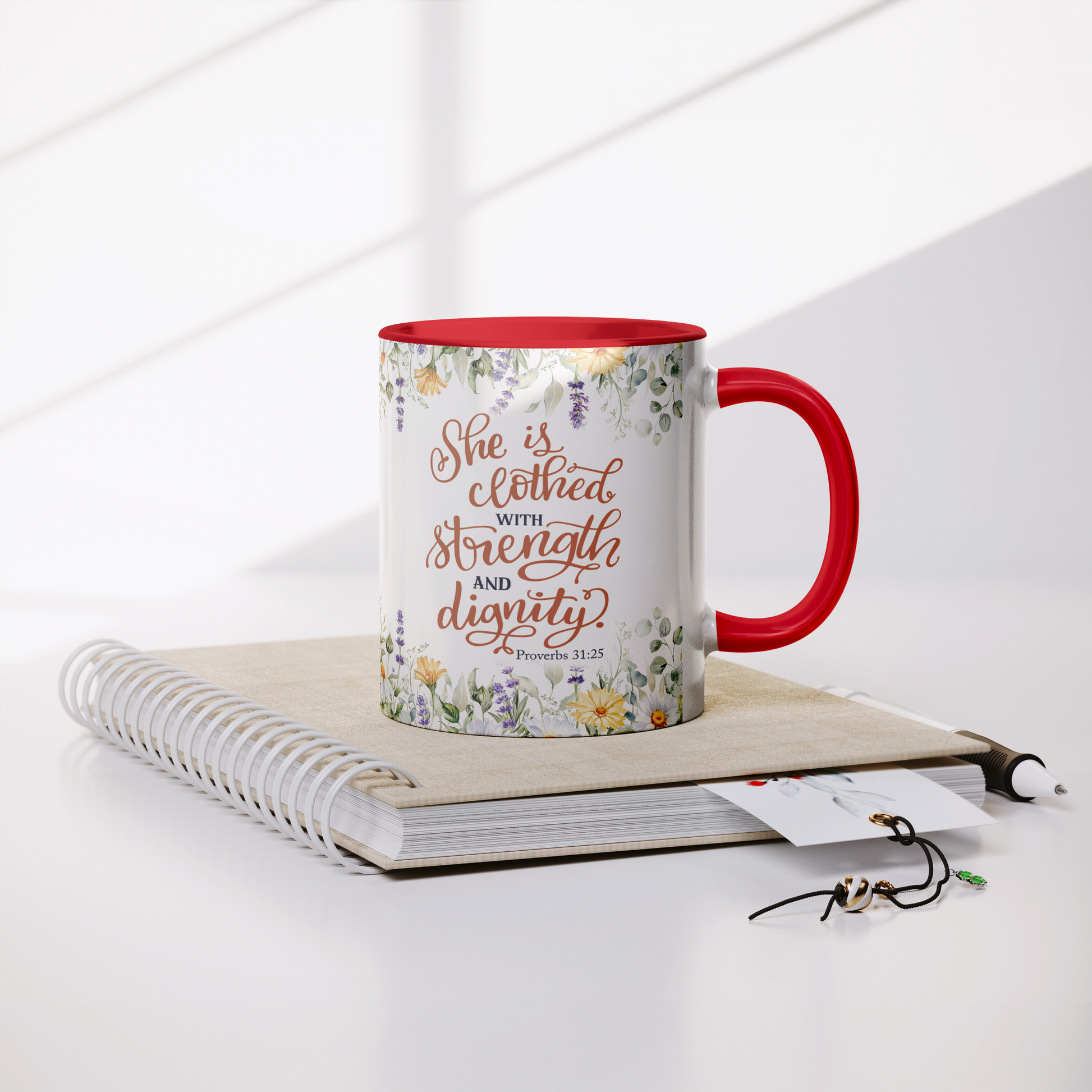 She_is_Clothed_in_Strength_and_Dignity_-_Lifestyle_Notebook_Mockup.png