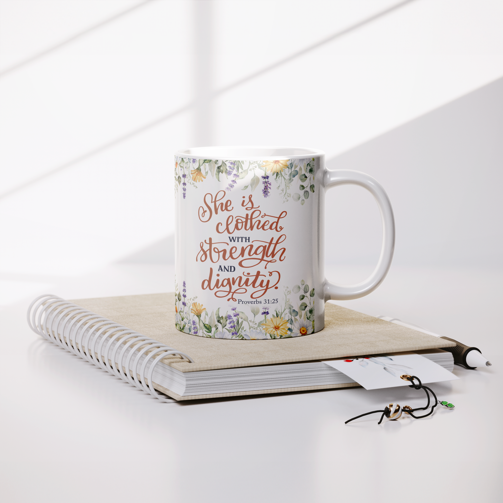 She_is_Clothed_in_Strength_and_Dignity_-_Lifestyle_Notebook_Mockup.png