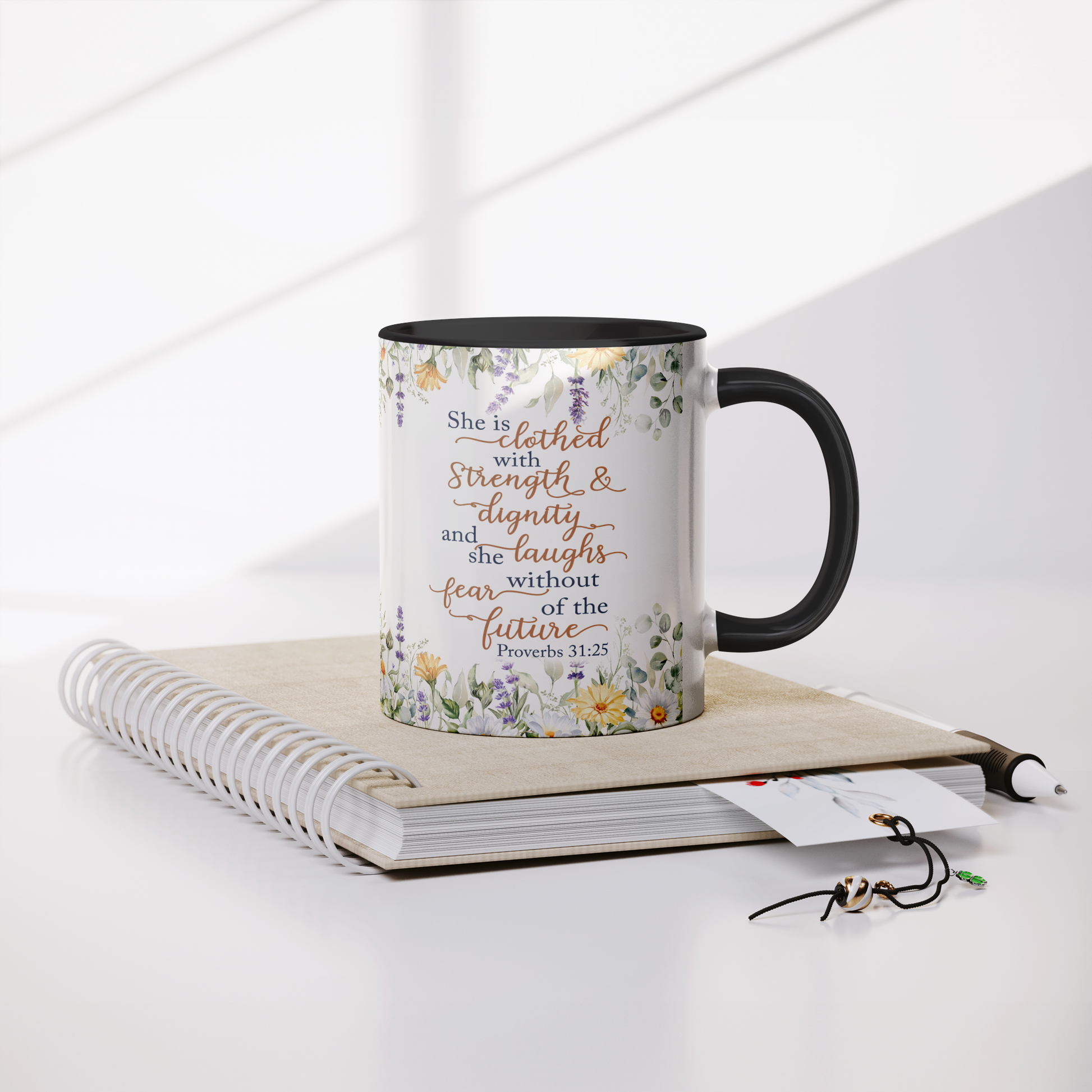 She_is_Clothed_in_Strength_and_Dignity_-_Mug_Lifestyle_Notebook_Mockup.png