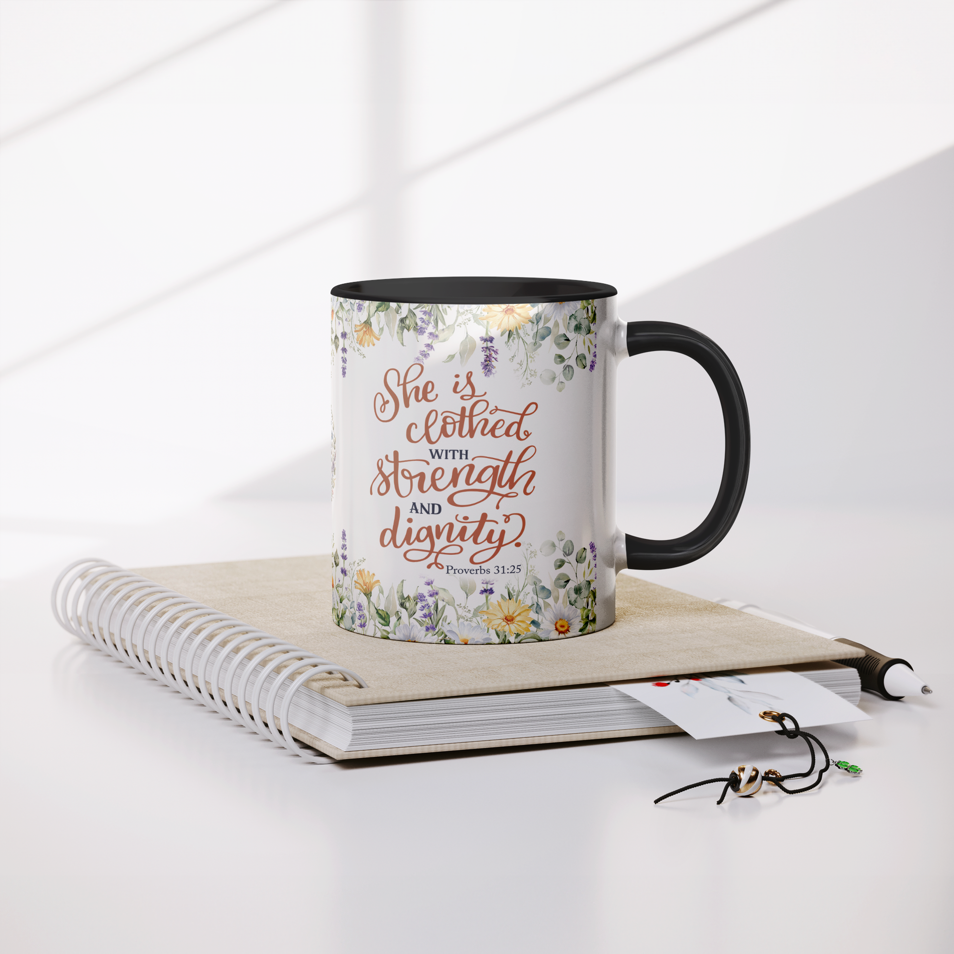She_is_Clothed_in_Strength_and_Dignity_-_Mug_Lifestyle_Notebook_Mockup.png