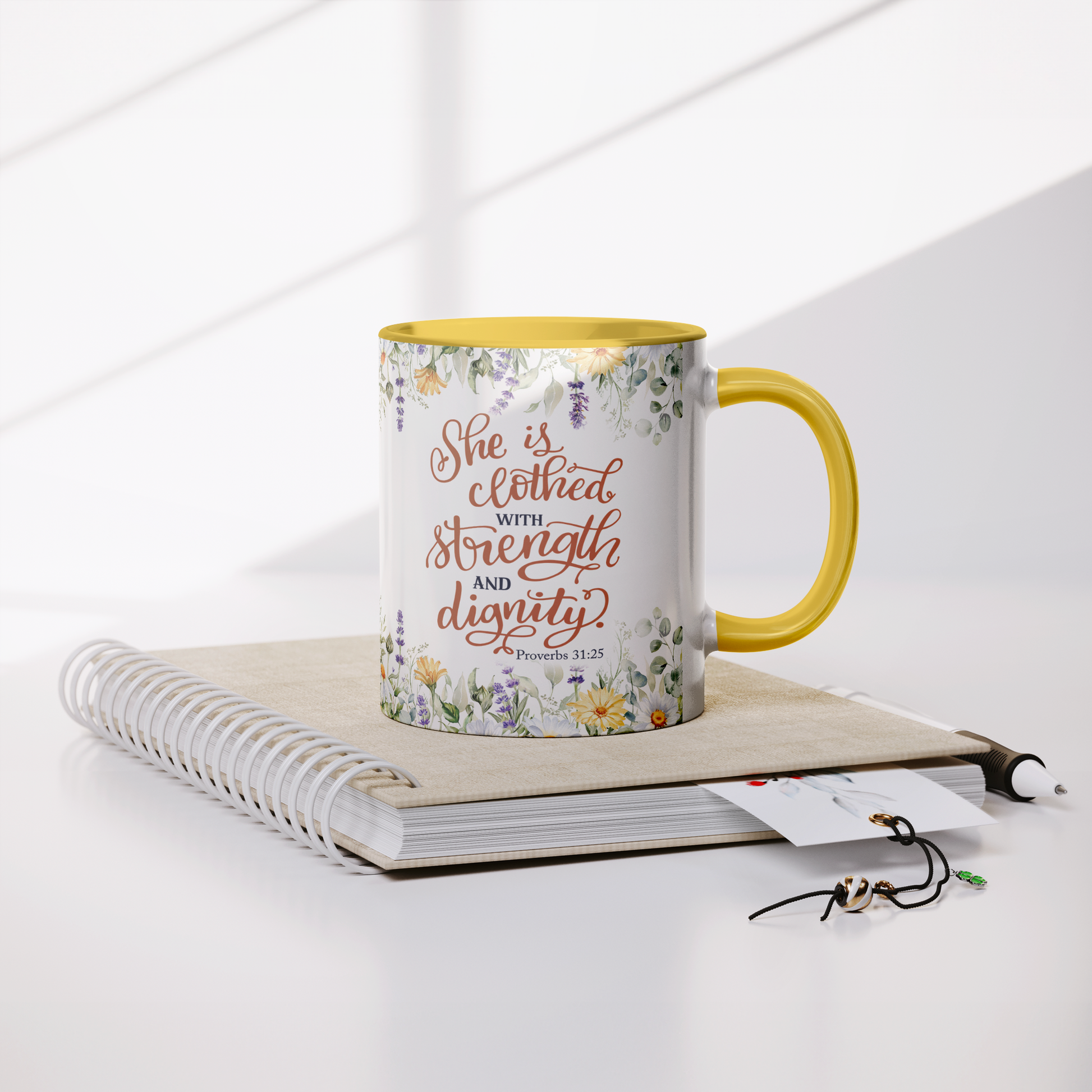 She_is_Clothed_in_Strength_and_Dignity_-_Notebook_Mockup.png
