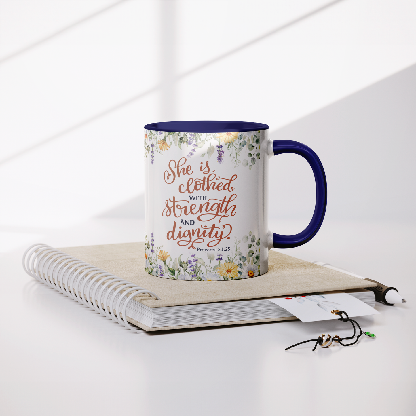 She_is_Clothed_in_Strength_and_Dignity_-_Notebook_Mockup.png